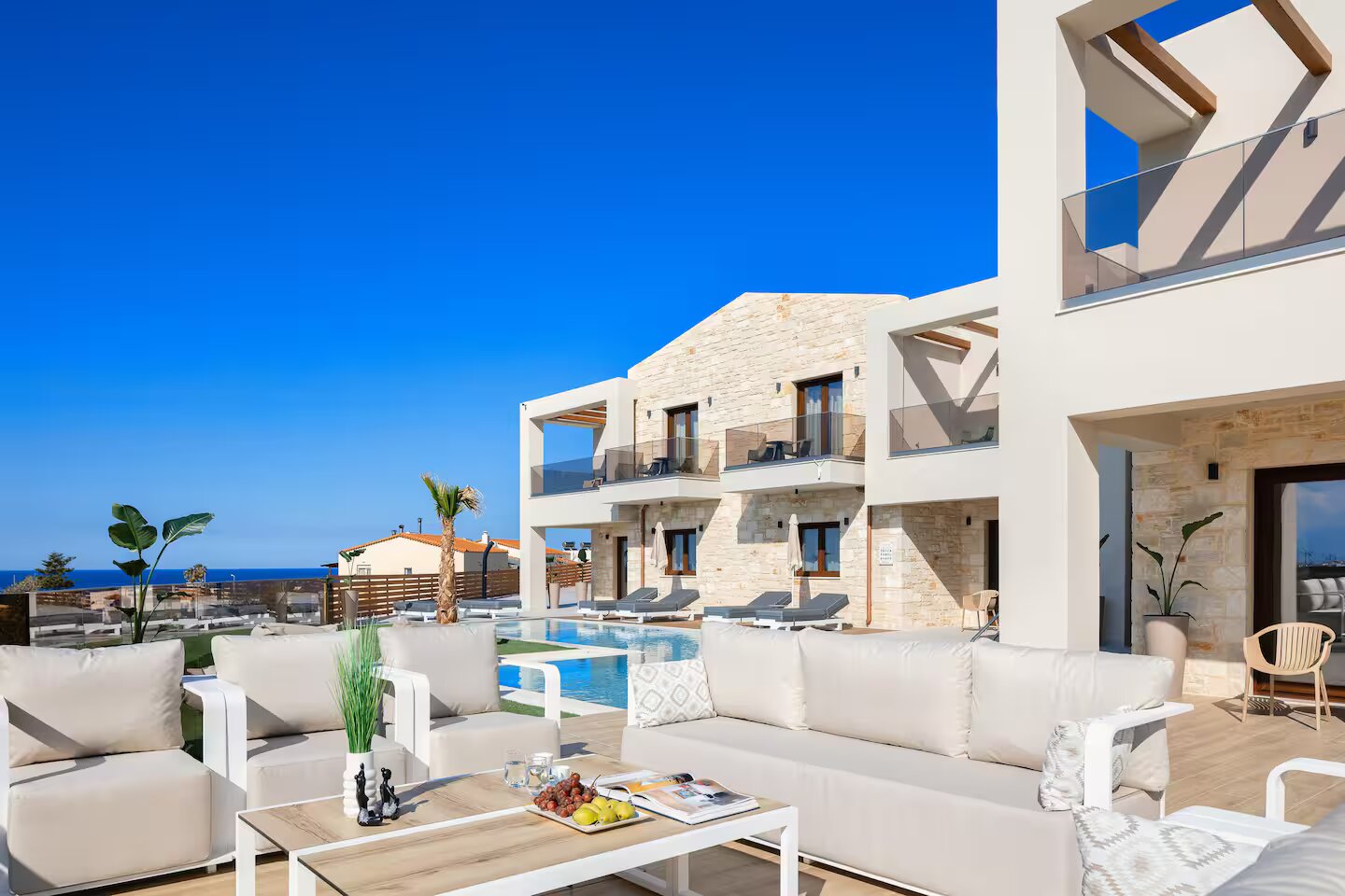 Vellis Residence outdoor lounge and pool